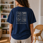 Model wearing oversized light blue coloring book lover t-shirt, Back View